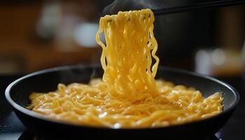 Delicious noodle cheese on black bowl with chopstick for simple lunch photo