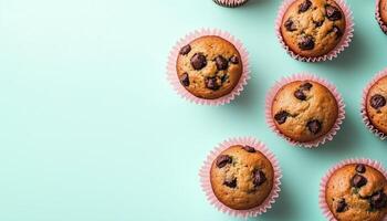 Sweet muffin cake cup with chocolate chips fruit topping photo
