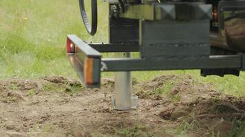Soil examination of agronomy. Geotechnical investigation. Collecting black soil on the field for examination and analysis. Special equipment for pickup 2 video