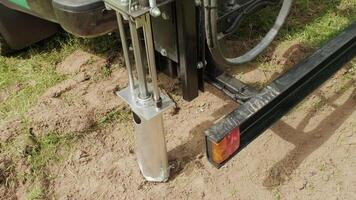 Soil examination of agronomy. Geotechnical investigation. Collecting black soil on the field for examination and analysis. Special equipment for pickup 7 video