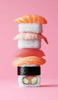 Sushi food stack with salmon, rice, seaweed and cucumber on pink solid background photo