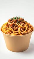 Spaghetti bolognese on brown paper bowl disposable container mockup photo