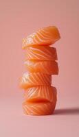 A stack of salmon slice seafood un cook superfood on vertical pink background photo