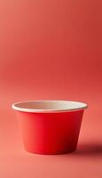Red paper bowl disposable and white inside for snack or soup packaging container photo