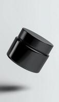 Pomade cream jar mockup black blank matte color floating on air white background photo