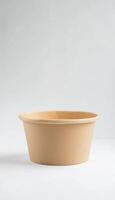 Blank empty brown paper bowl mockup on white solid vertical background photo