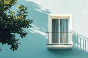 Balcony with a view sunlight on a teal wall photo