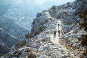 Hikers on a scenic mountain trail with breathtaking views photo
