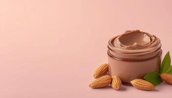 Natural almond nut extract clay mask on glass jar for skincare ingredient photo