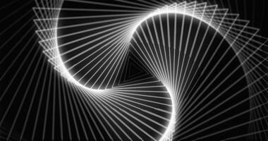 Triangular white shapes on black background in seamless loop video