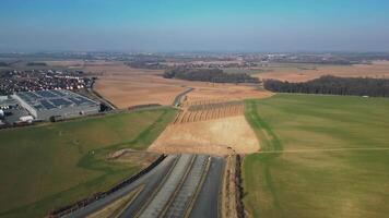 Aerial view of highway construction and field in Czechia in March 2025 video