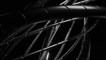 Black cables rotating in a complex structure on black background. Design video