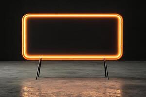 Rectangular black colored neon sign with orange light in dark room photo