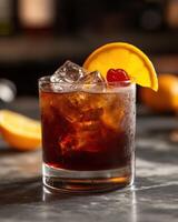 Refreshing tasmanian devil cocktail garnished with orange and cherry in a bar setting photo