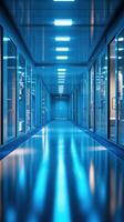 Empty futuristic corridor reflecting lights in modern laboratory photo