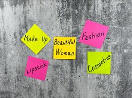 Stickers for notes with words about beautiful woman in beauty sphere. Fashion concept about cosmetology and the importance of makeup to attract attention to your beautiful appearance photo