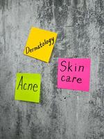 Skin care, important problem for people with epidermal defects. Bright stickers for notes with reminder to take care of your skin. Removal of acne and other skin defects photo