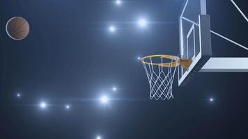 Basketball hit the basket in slow motion on the background of flashes of cameras video