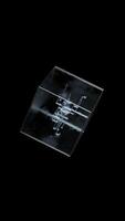 An Elegant and Transparent Geometric Cube Rendered on a Sophisticated Black Background with alpha channel video