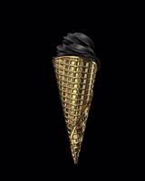 An elegantly designed black ice cream cone paired with a luxurious golden waffle cone video