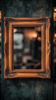 An old gold frame on a wall photo