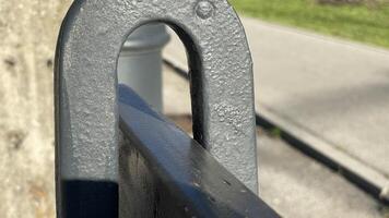 Capturing the play of light on weathered metal in a city park on a sunny afternoon photo