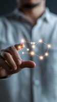 Creative connection with glowing nodes displayed by a hand in a light-filled environment photo