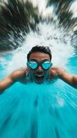 Young boy diving into a pool with enthusiasm during a sunny day at a recreational area photo