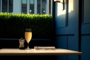 Refreshing mimosa on a sunny table in a cozy cafe with green plants in the background and soft light photo