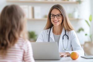 Friendly doctor interacts with child during consultation in modern clinic setting photo