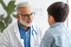 Friendly doctor engages with young patient during a check-up in a modern clinic photo