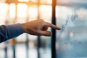 Business professional analyzing market trends on a digital screen during the afternoon in a corporate office photo