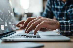 Hands typing on a laptop with digital interfaces displayed in a modern office environment during the day photo