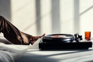 Relaxing afternoon with vinyl records playing on a turntable in a sunlit room photo