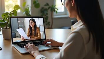 Indian HR Manager Conducting Virtual Job Interview with Remote Female Candidate via Call on Laptop Online Recruitment Process Concept with Space for Text Realistic Set 2 photo