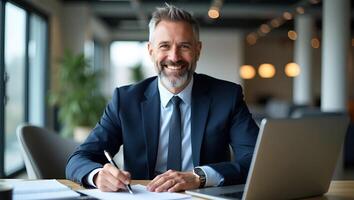 Middle aged smiling professional businessman and CEO wearing suit sitting at desk in modern office working on laptop and writing notes with copy space for text concept as Middle a Realistic Set 4 photo
