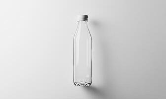 a clear plastic bottle on a white surface photo