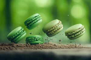 Vibrant colorful macaroons falling onto the ground, set against a soft, blurred green background photo