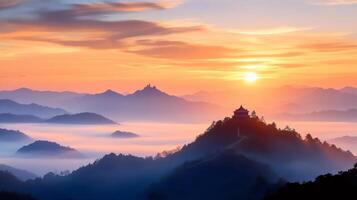 Sunrise illuminating pavilion on a mountain peak above a sea of fog in Jiangxi, China photo