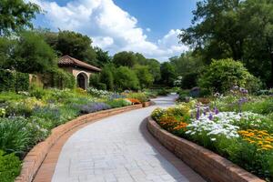 Winding path inviting visitors to explore colorful flowerbeds in a botanical garden photo