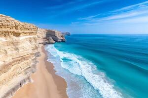 Stunning aerial view of Mughsail Beach in Salalah, Dhofar, Oman, featuring dramatic cliffs and turquoise water photo