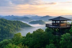 Scenic overlook at sunrise in the Appalachian Mountains with fog filling the valleys photo