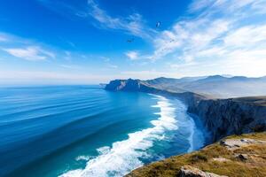 Seagulls flying over the cliffs and beaches of Asturias, Spain photo