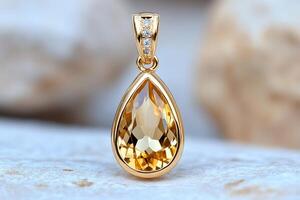 Gold pendant with large citrine and diamonds shining on textured background photo