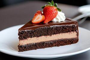 Delicious slice of chocolate cake with strawberries and whipped cream topping photo