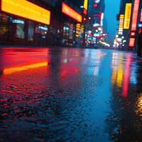 A wet street at night with neon lights photo