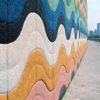 A colorful wall with waves on it photo