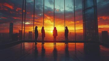 Business Leaders Engaged in Discussion Against a Dramatic Sunset Background photo