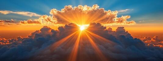 Sun shining through clouds photo