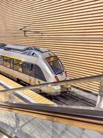 Modern High-Speed Train at Station Platform, Urban Transportation, Public Transit, Travel. High quality photo